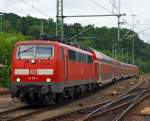 Die 111 011-3 zieht den RE 9 (Rhein-Sieg-Express) Aachen-Kln-Siegen, hier am 24.06.2012 bei der Einfahrt in den Bahnhof Betzdorf (Sieg).