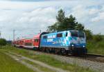 111 017-0 (Maxl) ist mit dem RE Mnchen - Salzburg am 30.07.2012 in Ostermnchen