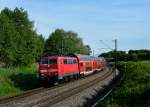 111 225 mit einem RE nach Salzburg Hbf am 29.05.2011 unterwegs bei Gutmart.