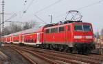 Eine RE 4 bei der Ausfahrt aus dem Bahnhof Rheydt am 14.3.2012....heute wre die Aufnahme so nicht mehr mglich, da der Platz heute gesperrt ist von der Bahn.