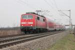 111 050-1 am 27.03.2013 mit einem RE von Offenburg nach Basel Bad Bf. Hier ist der RegionalExpress bei Hgelheim. 