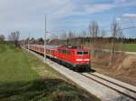 Die 111 036 mit einer RB nach Mittenwald am 14.04.2013 unterwegs bei Huglfing.