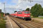 Gerade kommt die 111 125-1 in den Rheydter Hbf auf Gleis 3 eingefahren mit ihrem RE4-Zug nach Aachen Hauptbahnhof.