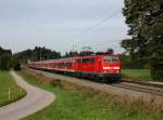 Die 111 036 mit einem RE nach Salzburg am 22.09.2013 unterwegs bei Hufschlag.