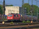 111 116 schiebt am 12.04.2014 RE4 aus Aachen West Richtung Herzogenrath auf der KBS 485.