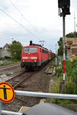 Mit verminderter Geschwindigkeit durchfährt die 111 146-7 mit ihrem RE4 die Baustelle in Kleinenbroich auf ihrem Weg nach Aachen. 6.7.2014
