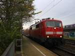 111 116 DB kommt die Kohlscheider-Rampe hoch aus Richtung Neuss,Herzogenrath mit dem RE4 aus Dortmund-Hbf-Aachen-Hbf und fährt durch Kohlscheid in Richtung Richterich,Laurensberg,Aachen-West bei