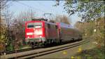 Die 111 013-9 zieht den Wupper Express (RE4) nach Aachen.Hier zu sehen im Gleisbogen bei Rimburg auf der Kbs 485 am 22.Nov.2014.