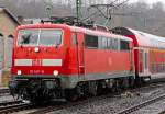   Bei leichtem Regen fährt die 111 147-5 (91 80 6111 147-5 D-DB) der DB Regio NRW am 03.01.2015 mit dem RE 9 - Rhein Sieg Express (RSX) Aachen - Köln - Siegen in den Bahnhof Betzdorf/Sieg