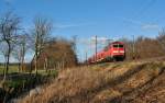 111 145-9 fuhr am 03.04.2015 mit einem RE von Emden nach Münster, hier zwischen Leer und Ihrhove.