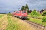 In Herrath ist hier die 111 156 mit einem Dostock RE4 nach Aachen unterwegs. 23.5.2015