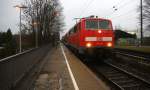 111 129 DB kommt die Kohlscheider-Rampe hoch aus Richtung Neuss,Herzogenrath mit dem RE4 aus Dortmund-Hbf nach Aachen-Hbf und hält in Kohlscheid und fährt dann weiter in Richtung Richterich,Laurensberg,Aachen-West,Aachen-Schanz,Aachen-Hbf. Aufgenommen vom Bahnsteig 2 in Kohlscheid. Bei Regenwetter am Morgen vom 2.2.2016.