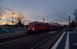 RE4 gezogen von der 111 155 bei der Durchfahrt in Kleinenbroich auf ihrem Weg nach Dortmund. 10.2.2016