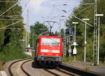 Ein Nachschuss von der 111 113 DB schiebt den RE4 aus Aachen-Hbf nach Dortmund-Hbf und kommt aus Richtung