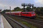 Nachschub leistet die 111 012 an einem RSX nach Aachen. Hier ist der Zug in Merzenich am Sonntag den 23.10.2016