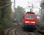 Ein Nachschuss von der 111 156 DB schiebt den RE4 aus Aachen-Hbf nach Dortmund-Hbf und kommt aus Richtung