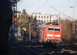 Ein Nachschuss von der 111 125-1 DB  schiebt den RE4 aus Aachen-Hbf nach Dortmund-Hbf und kommt aus Richtung Aachen-Hbf,Aachen-Schanz,Aachen-West,Laurensberg,Richterich,Kohlscheid,Herzogenrath,Palenberg,Zweibrüggen,Frelenberg,Geilenkirchen,Süggerrath,Lindern,Brachelen,Hückelhoven-Baal,Baal und hält gleich in Erkelenz und fährt dann weiter in Richtung Herrath,Beckrath,Wickrath,Rheydt-Hbf,Mönchengladbach-Hbf. 
Aufegenommen von einem Weg in Erkelenz.
Bei Sonnenschein am Kalten Nachmittag vom 29.12.2016.  