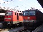 Die 111 031 und die 1144 226 im Innsbrucker Hauptbahnhof am 31.07.2006