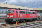 Lok 111 056-8, ex DB, steht am 08.03.2023 auf einem Abstellgleis beim badischen Bahnhof.