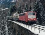 111.048 mit Z 1129 am 16.01.1999 bei der Ausfahrt aus dem Bf. Kolbnitz.