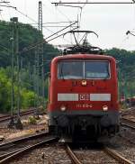 Als lokbespannter Zug fhrt der Rhein-Sieg-Express (Aachen - Kln - Siegen) auch noch, hier 111 015-4 mit dem RE 9 bei der Einfahrt in den Bahnhof Betzdorf (Sieg) am 12.06.2012.
