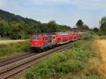 Die 111 024 mit dem BR Radlzug nach Piding am 04.08.2012 unterwegs bei Dettenhofen.