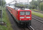 112 102 mit RE 13290 von Warnemnde nach Berlin-Ostbahnhof bei der Durchfahrt in Rostock-Bramow.04.06.2017 