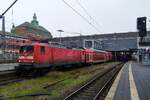 112 156-5 der DB Regio Schleswig-Holstein (DB Regio Nord, Kiel), eine der wenigen 112er der DB mit aufgedruckter Prüfziffer, am 12.2.2023 mit der RB86 (Lübeck Hbf-Lübeck-Travemünde