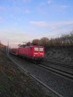 112 173-0 rast am 21.01.09 mit RE 21425 Lbeck Hbf - Hamburg Hbf bei Altenfelde zum nchsten planmigen Halt nach Reinfeld (Holst.).