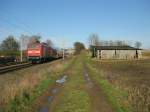 112 148-2 schiebt am 27.03.09 den RE 21572 nach Lbeck Hbf hier kurz hinter Reinfeld (Holst.).