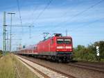 112 151-6 beschleunigt am 17.06.09 die RB 21325 nach Hamburg Hbf und wird in wenigen Minuten wieder abbremsen mssen um in Kupfermhle zu Halten.