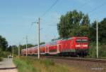 112 149-0 schiebt den RE 21415 Lbeck Hbf - Hamburg Hbf durch den Stadtrand von Bad Oldesloe und wird gleich zum Planhalt in der Kreisstadt Stormarns zum stehen kommen.