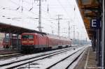 112 169-8 mit dem RE (RE 17709) nach Halle(Saale)Hbf in Stendal. 04.01.2011