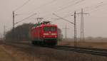 Nchster Halt Ahrensdorf: Dort kam direkt nach dem ersten angucken der Fotostelle 112 190 von Dessau (frisch revidiert) nach Berlin Lichtenberg.