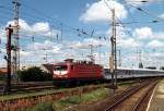 Abschied vom Interregio-hier 112 036 vor IR2635 nach Cottbus bei der Einfahrt in Wittenberge, hier auf der mittlerweile abgebauten  Magdeburger Seite -Juli 1997