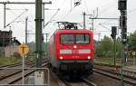 112 124-3 mit RE 18591  Warnemnde-Express  von Warnemnde nach Berlin Hbf in Schwerin Hbf am 19.05.2013