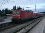 RE 13024 Binz-Stralsund hielt,am 29.Juli 2013,mit 112 114 und Dostos in Bergen/Rgen.