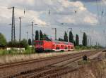 Die 112 112 mit einem RE am 09.07.2011 unterwegs bei Köthen.