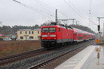 Die 112 101 auf der Linie RE 5von Elsterwerda nach Rostock Hbf mit dem RE 4360 am 25.03.2016 in Nassenheide.