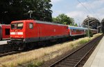 112 141-7 brachte am 24.6.2016 den Ersatzpark als RE70 (RE21018) von Hamburg Hauptbahnhof nach Kiel Hauptbahnhof.