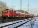 112 184-7 mit einem RE 5 in Richtung Stralsund am 17. Januar 2017 auf dem südlichen Berliner Außenring in Diedersdorf.