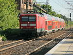 112 122 als RE 3 nach Falkenberg bei der Durchfahrt in Großbeeren.		  