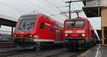 114 030 und ein Dosto-Steuerwagen 3. Generation posieren in Fulda. Aufgenommen am 9.3.2018 16:53