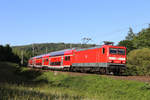 114 038 der Deutschen Bahn AG war am 28. Mai 2020 mit der Regionalbahn 15527 von Wächtersbach nach Frankfurt am Main unterwegs, hier bei Gelnhausen.