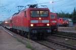 20.08.2007 frh am Morgen im Bhf.Falkenberg/E.114 016-9 mit RE3 nach Stralsund, 143 069-3 mit RE18 nach Cottbus und 143 156-8 mit RB nach Dessau.