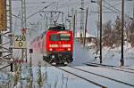 114 003 kommt mit der RE 3 nach Elsterwerda gerade aus Stralsund, hier am Abzwg.