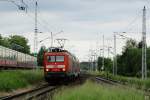 Mit dem RE 3 nach Wnsdorf-Waldstadt fhrt 114 024-3 am 12.6.2010 in den Bahnhof Blankenfelde ein.