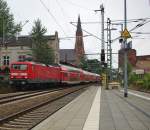 Ankunft der RE4 nach Wismar in Schwerin. Gezogen von 114 032-6. Aufgenommen am 08.08.2010.