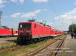 114 036 steht in Falkenberg/Elster bereit um den RE38318 nach Stralsund zu ziehen, 10.06.06