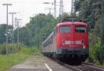 115 205-7 mit dem IC-Pendel Hamm-Bonn bei der Durchfahrt in Kln West, am Zugschluss lief kalt die 115 332-9 mit, 12.8.10